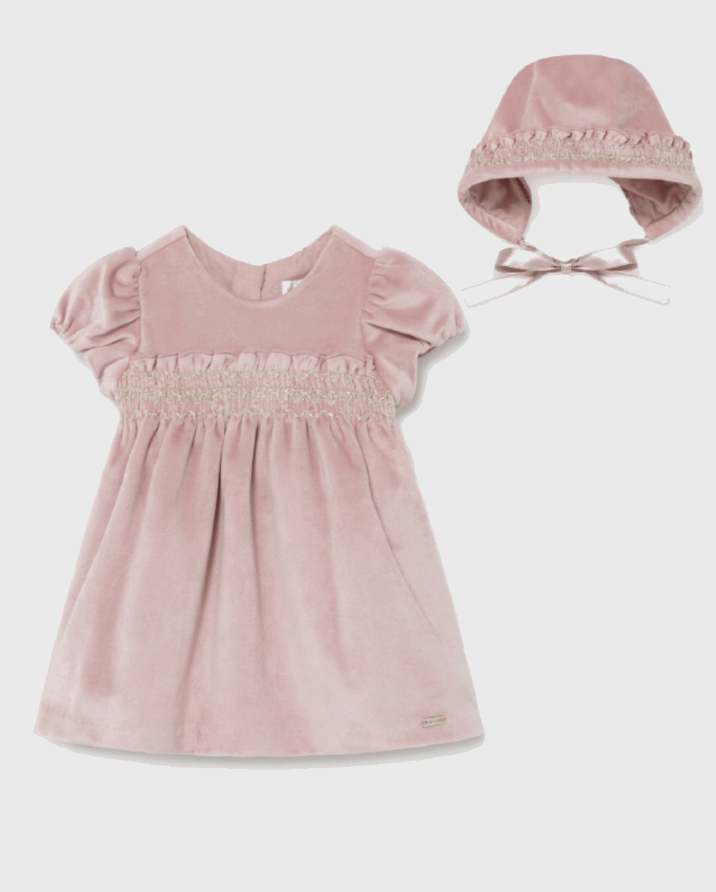 a pink velvet dress and bonnet