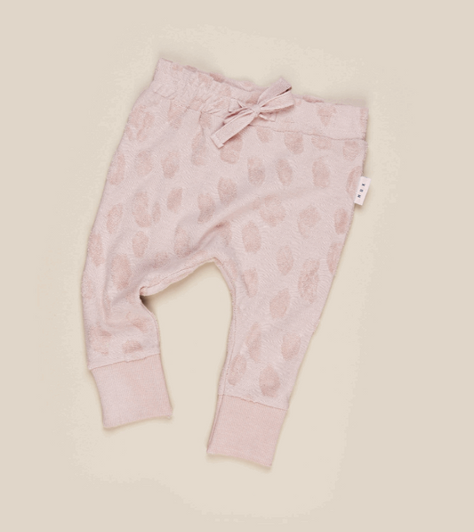 pink joggers with soft textured animal print