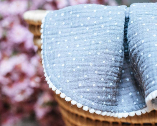 Grey polka dot pompom baby blanket